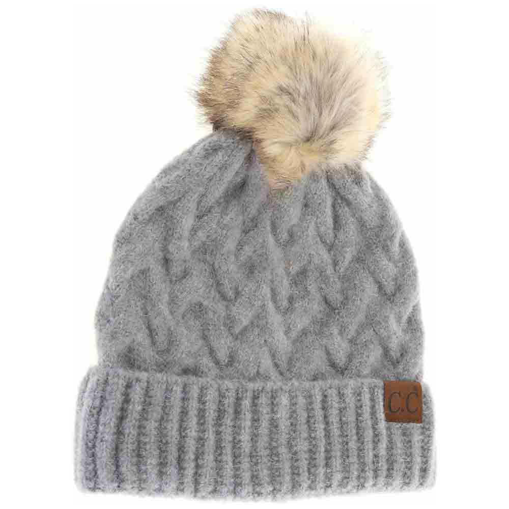 Lt. Grey Chunky Braided Cable Knit Fur Pom C.C Beanie combines classic craftsmanship with modern warmth. Expertly knit with thick braided cables, this beanie provides robust insulation against cold weather. The plush fur pom adds a refined, textured accent, enhancing both style and comfort. Designed for a snug yet flexible fit, it offers reliable protection for winter activities while elevating your everyday cold-weather wardrobe. 