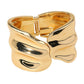 Madeline Love Gold Sculpted Wavy Wide Metal Hinged Bangle Bracelet - Bracelets - desc