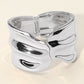Madeline Love Silver Sculpted Wavy Wide Metal Hinged Bangle Bracelet - Bracelets