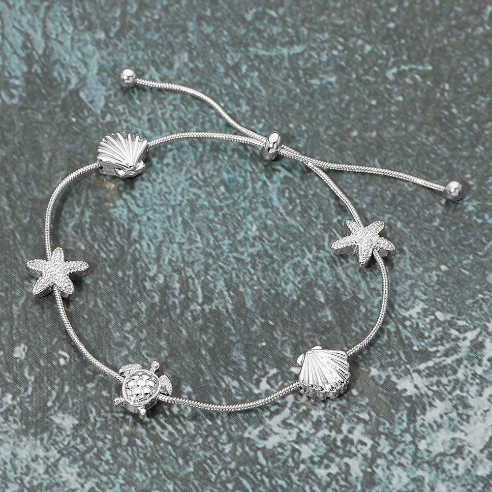 Madeline Love Silver Textured Metal Starfish Shell Turtle Station Cinch Pull Tie Bracelet - Bracelets