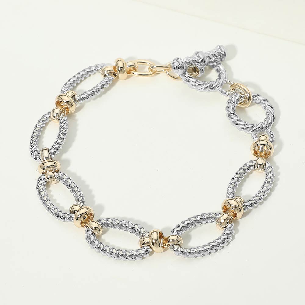 Madeline Love Two Tone 14K Gold Plated Two Tone Textured Oval Link Toggle Bracelet