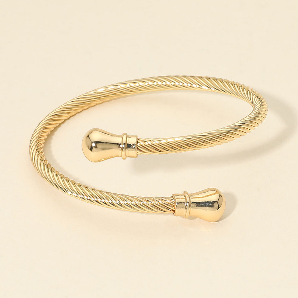 Madeline Love Gold Twisted Metal Cable Bangle Bracelet - Bracelets
