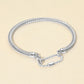 Madeline Love Rhodium Carabiner Accent Twisted Cable Bangle Bracelet - Bracelets