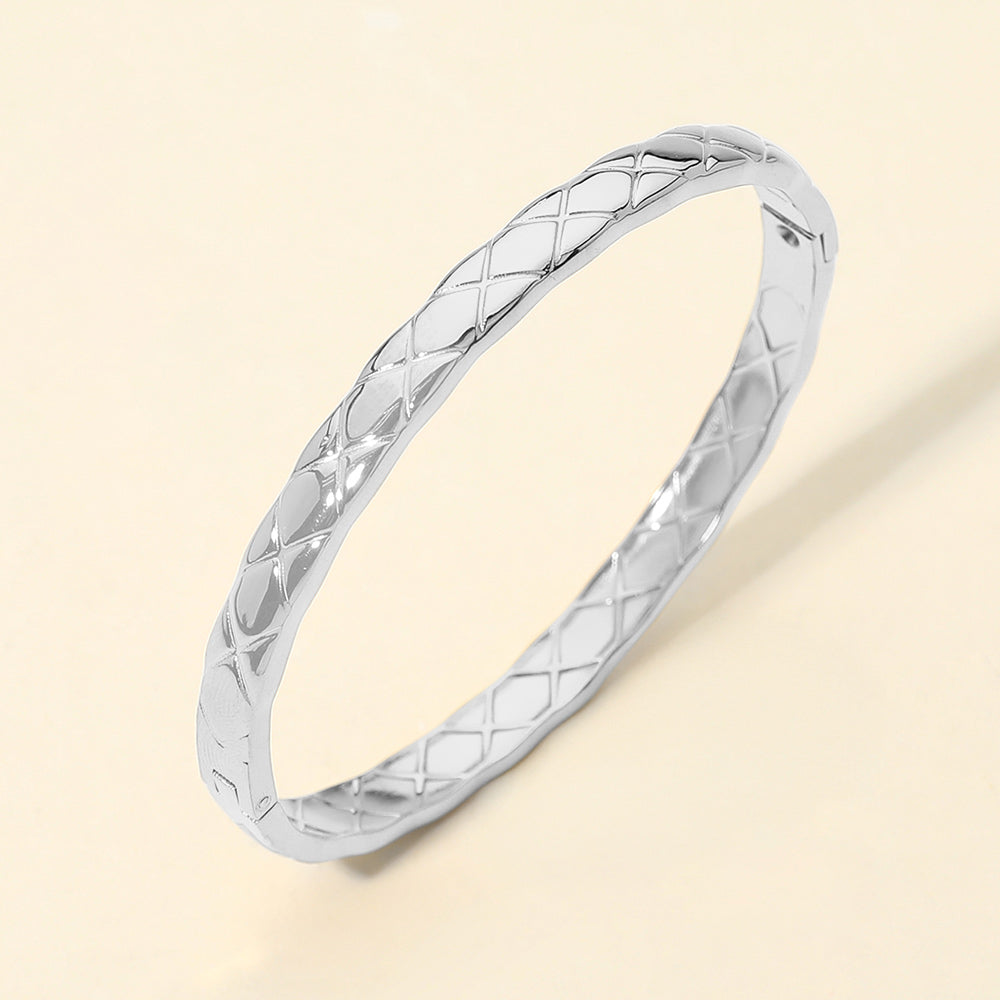 Madeline Love Silver Stainless Steel Crisscross Textured Hinged Bangle Bracelet - Bracelets