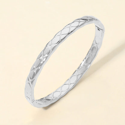 Madeline Love Silver Stainless Steel Crisscross Textured Hinged Bangle Bracelet - Bracelets