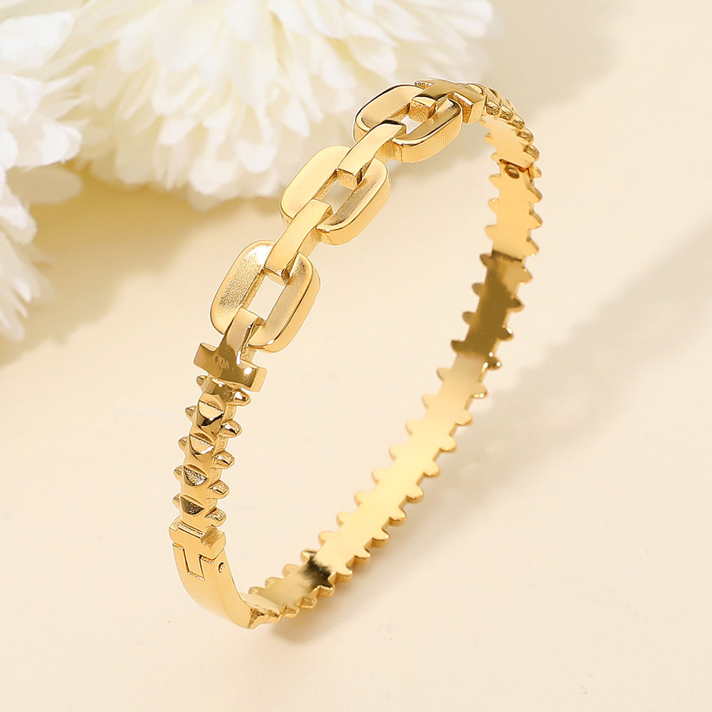 Madeline Love Gold Stainless Steel Sculpted Link Hinged Bangle Bracelet