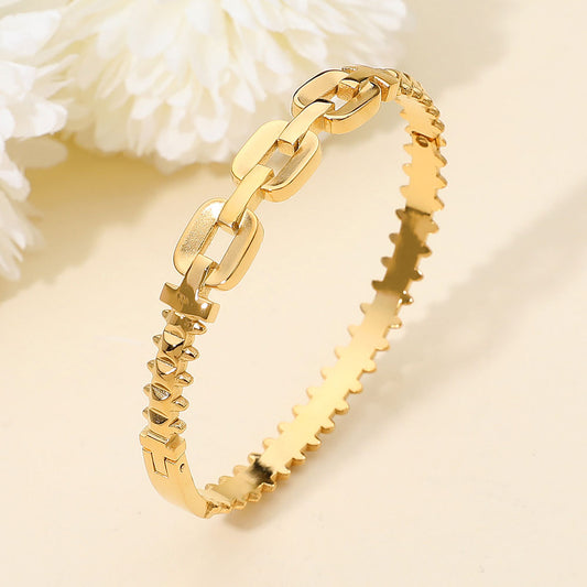 Madeline Love Gold Stainless Steel Sculpted Link Hinged Bangle Bracelet