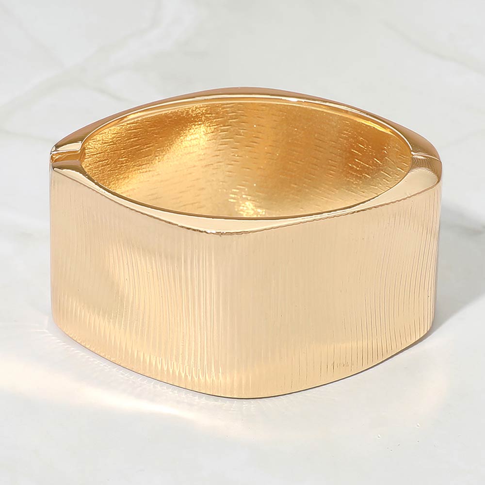 Madeline Love Gold Bold Ribbed Metal Hinged Bangle Bracelet - Bracelets
