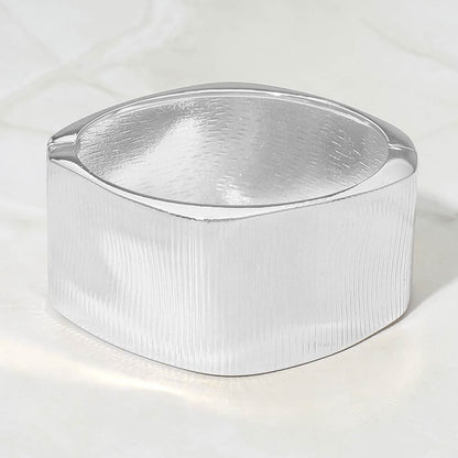 Madeline Love Silver Bold Ribbed Metal Hinged Bangle Bracelet - Bracelets