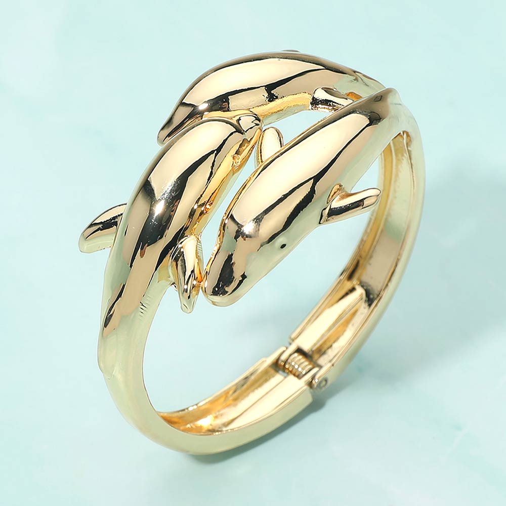 Madeline Love Gold Sleek Double Dolphin Hinged Bangle Bracelet - Bracelets