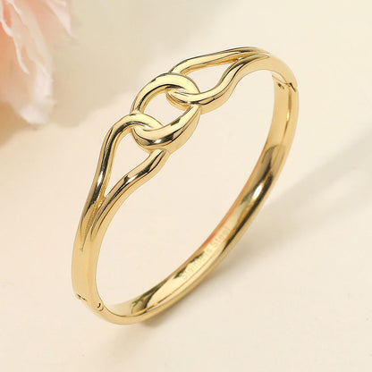 Madeline Love Gold Stainless Steel Twist Link Hinged Bangle Bracelet - Bracelets