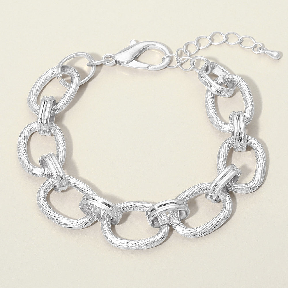 Madeline Love Worn Silver Textured Metal Oval Link Chain Bracelet - Bracelets