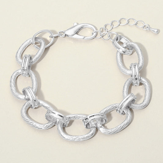 Madeline Love Worn Silver Textured Metal Oval Link Chain Bracelet - Bracelets