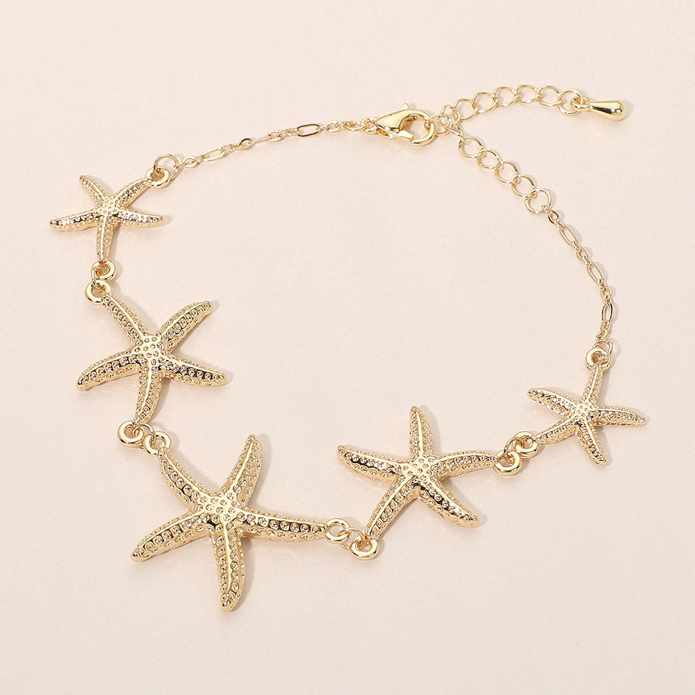Madeline Love Gold Textured Metal Starfish Link Bracelet