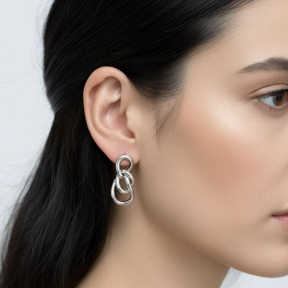 Madeline Love Silver, White Gold White Gold Dipped Triple Interlocking Hoop Drop Earrings - extra