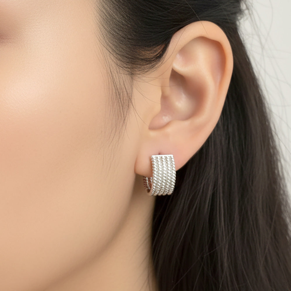 Madeline Love Silver, White Gold White Gold Dipped Textured Huggie Hoop Earrings - desc
