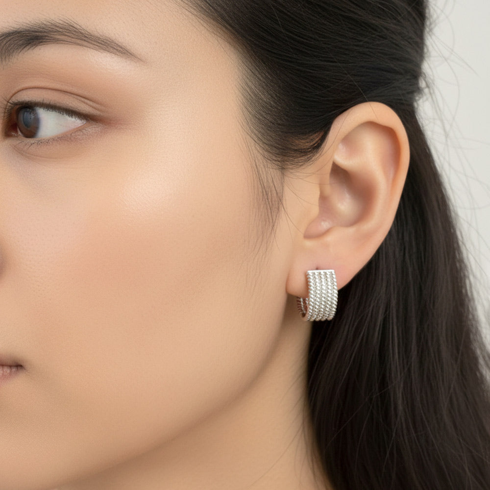 Madeline Love Silver, White Gold White Gold Dipped Textured Huggie Hoop Earrings - extra
