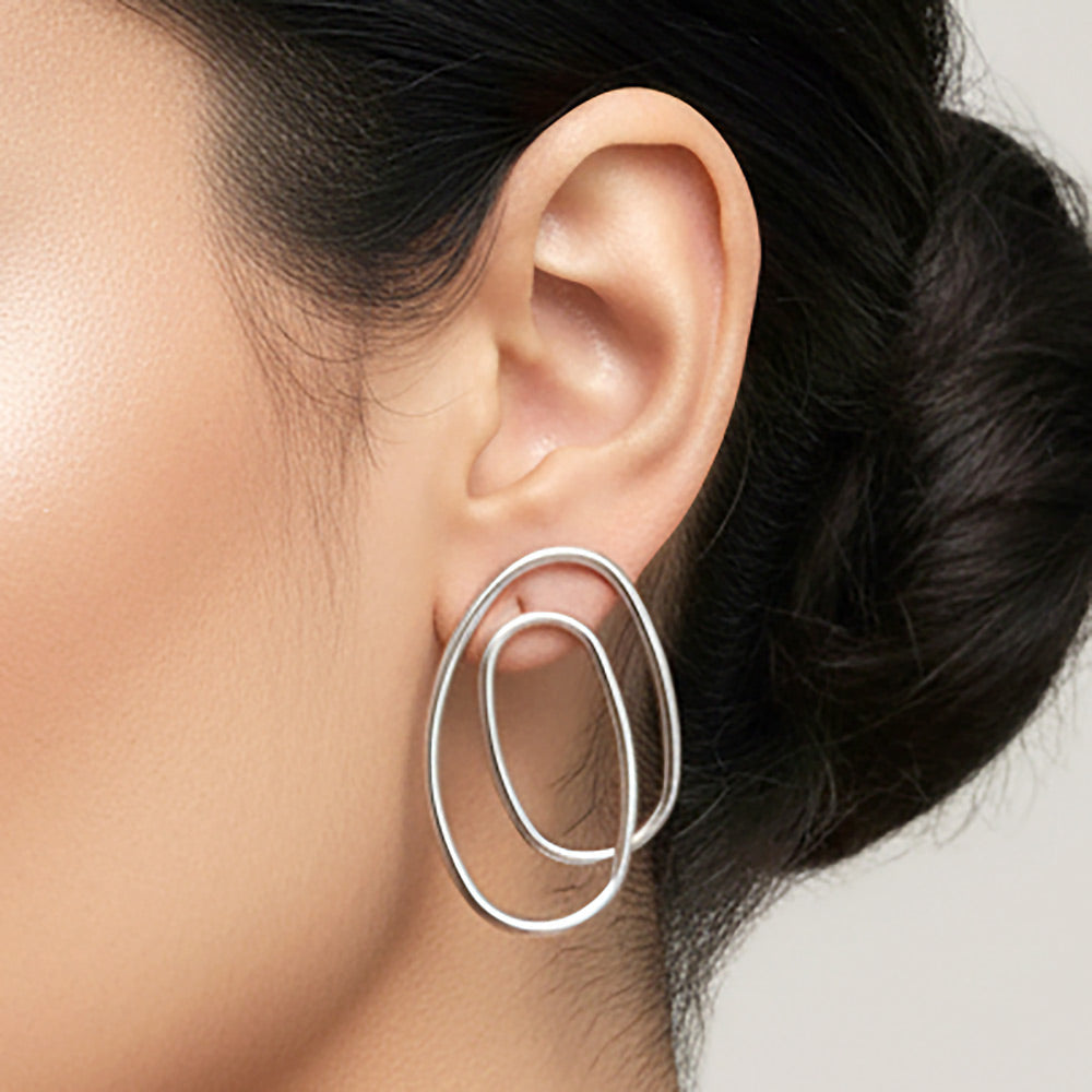 Madeline Love Silver, White Gold White Gold Dipped Sculptural Oval Earrings - desc