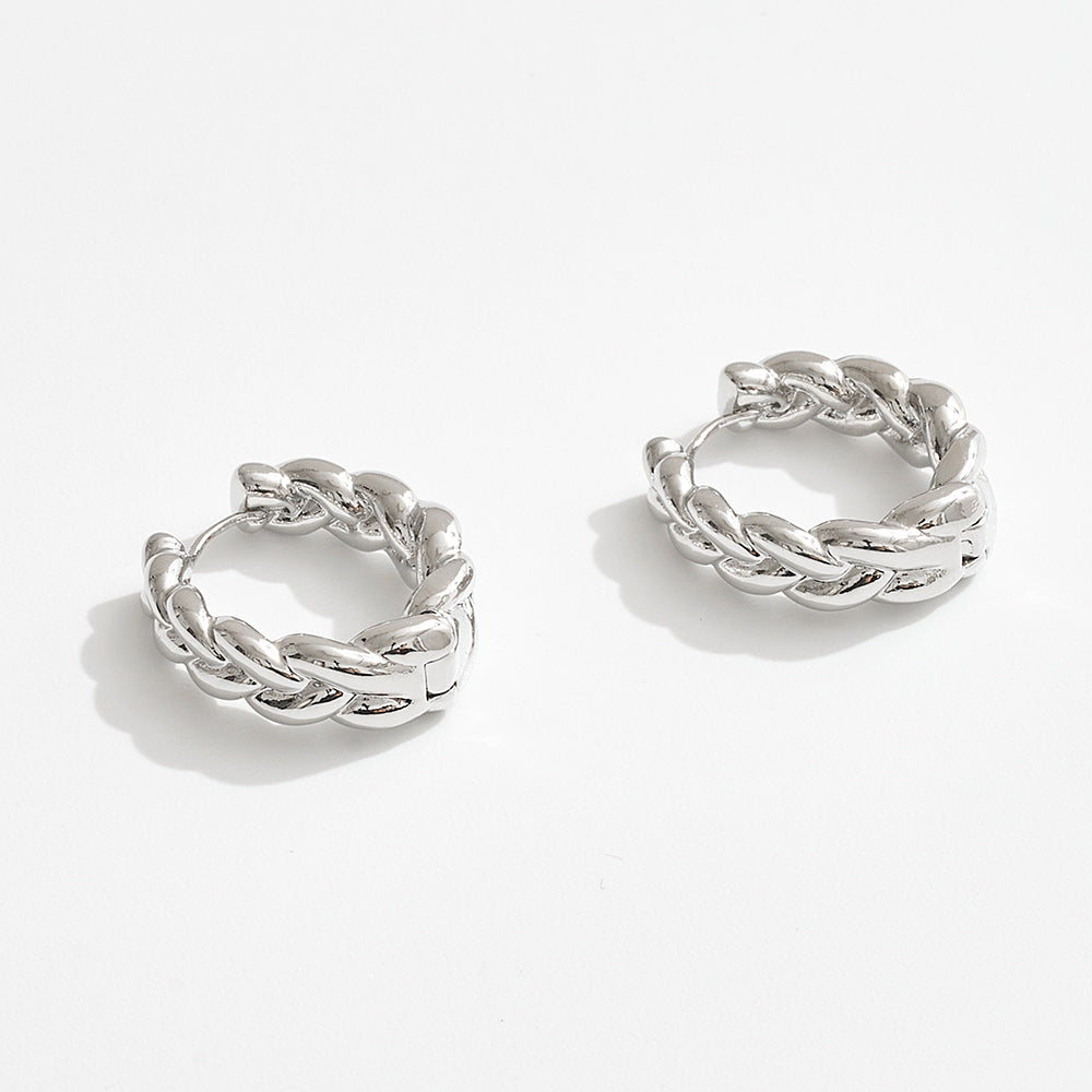 Madeline Love Silver, White Gold White Gold Dipped Chunky Braided Huggie Hoop Earrings - desc