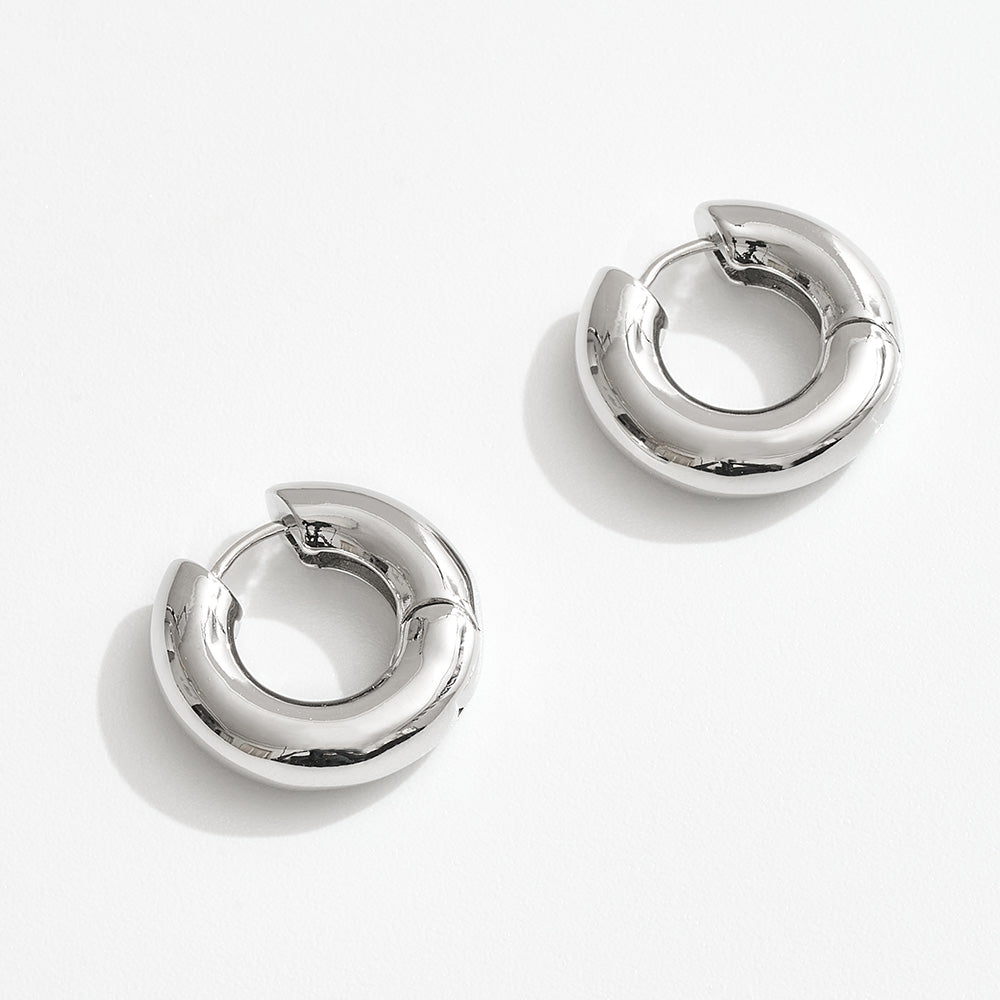 Madeline Love Silver, White Gold White Gold Dipped Chunky Huggie Hoop Earrings