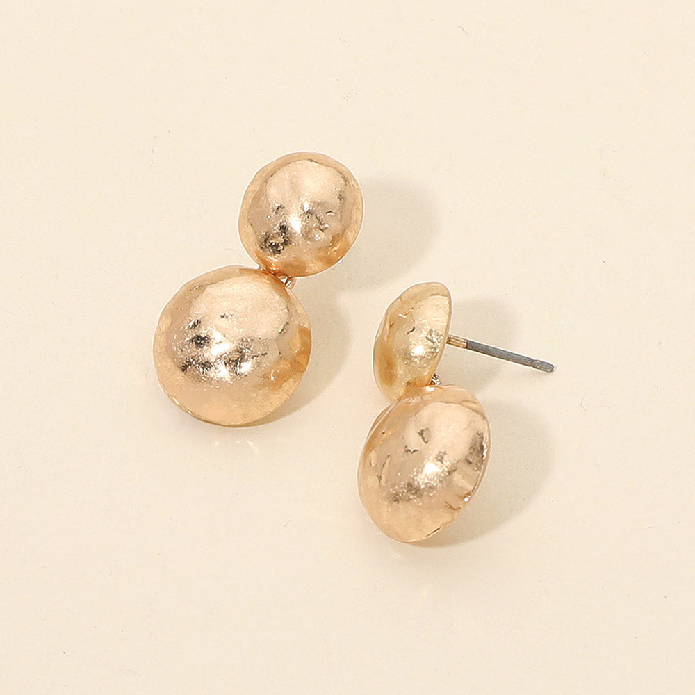 Madeline Love Worn Gold Hammered Metal Double Dome Dangle Earrings