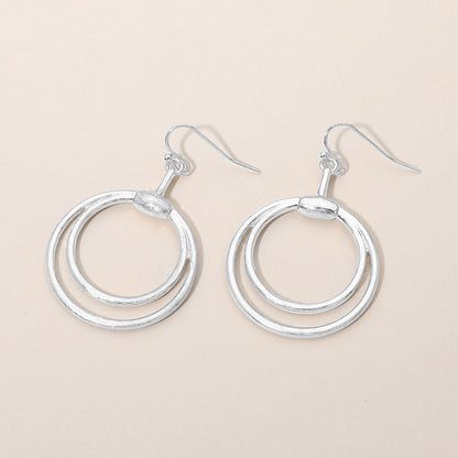 Madeline Love Worn Silver Open Metal Double Layered Circle Drop Earrings