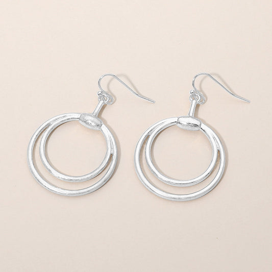 Madeline Love Worn Silver Open Metal Double Layered Circle Drop Earrings
