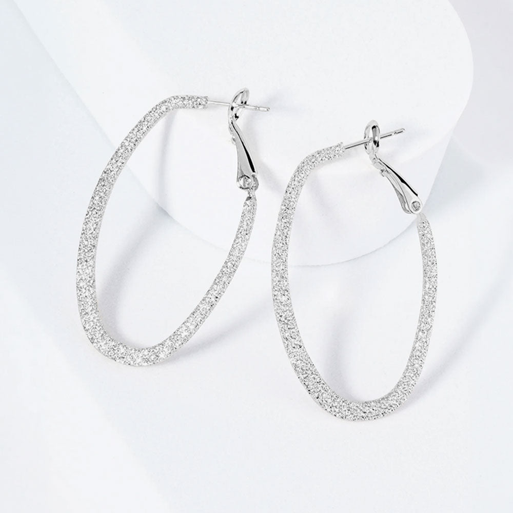 Madeline Love Rhodium Rhodium Plated Hypoallergenic Textured Oval Hoop Earrings