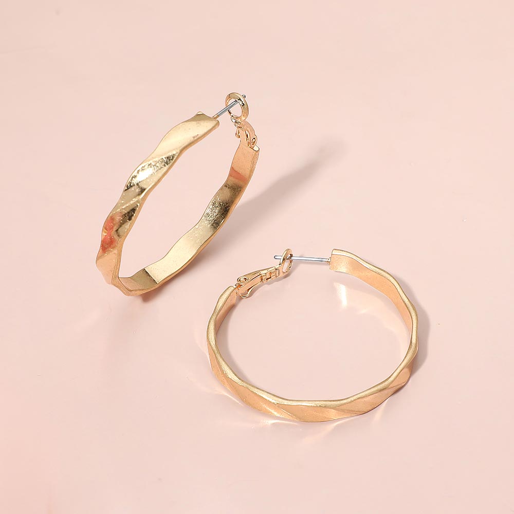 Madeline Love Worn Gold Twisted Metal Hoop Earrings