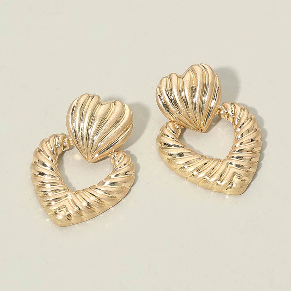 Madeline Love Worn Gold Textured Metal Double Heart Earrings