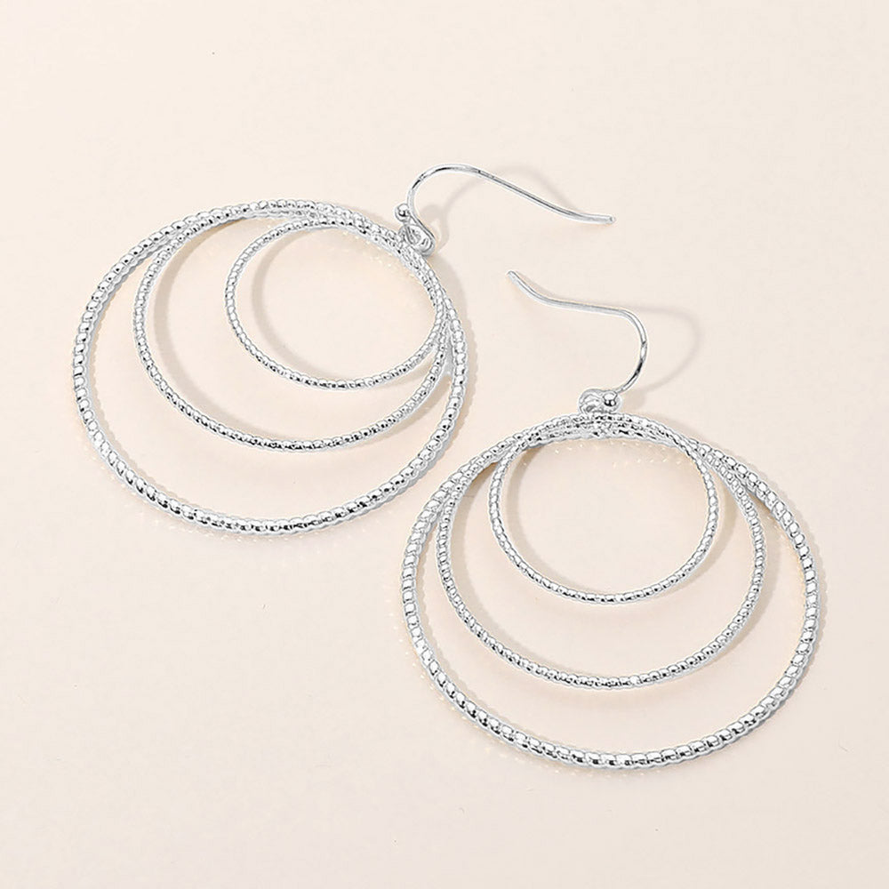 Madeline Love Silver Textured Metal Triple Layered Hoop Dangle Earrings