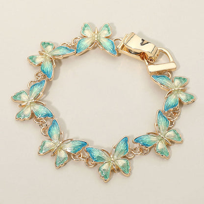 Madeline Love Blue, Gold Butterfly Link Magnetic Bracelet - Bracelets