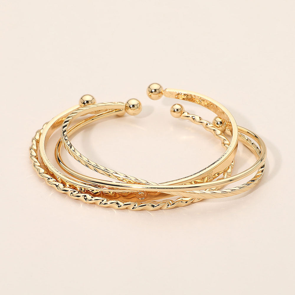 Madeline Love Gold Gold Dipped Textured Metal Cuff Multi Layered Bracelets