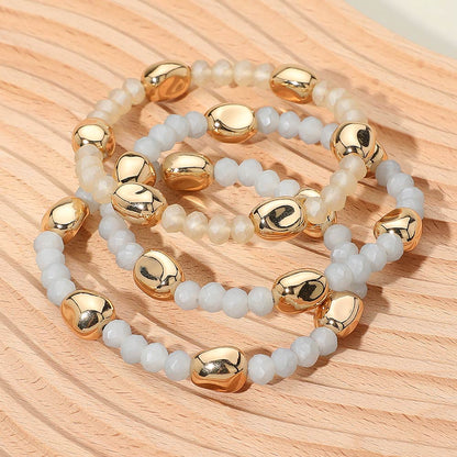 Madeline Love Gold, Neutral 3PCS - Worn Metal Pebble Beaded Stretch Multi Layered Bracelets