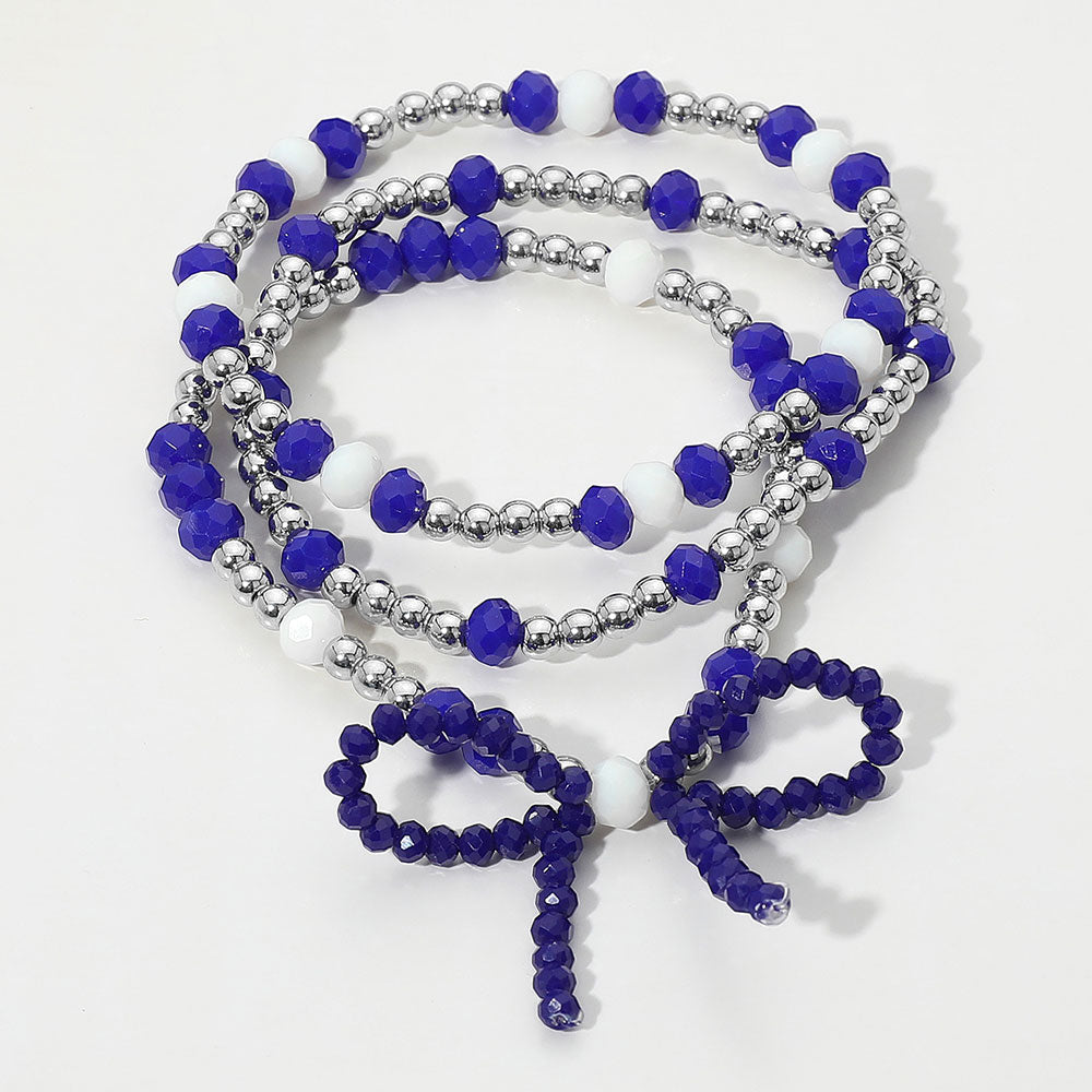Madeline Love Blue, Rhodium, White 3PCS - Sports Team Theme Colored Bow Accent Faceted Beaded Stretch Multi Layered Bracelets