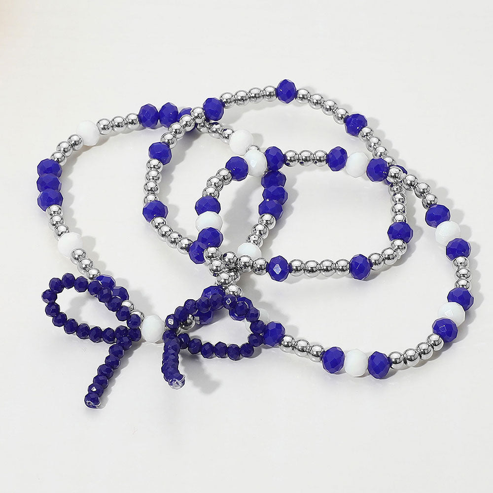 Madeline Love Blue, Rhodium, White 3PCS - Sports Team Theme Colored Bow Accent Faceted Beaded Stretch Multi Layered Bracelets - extra