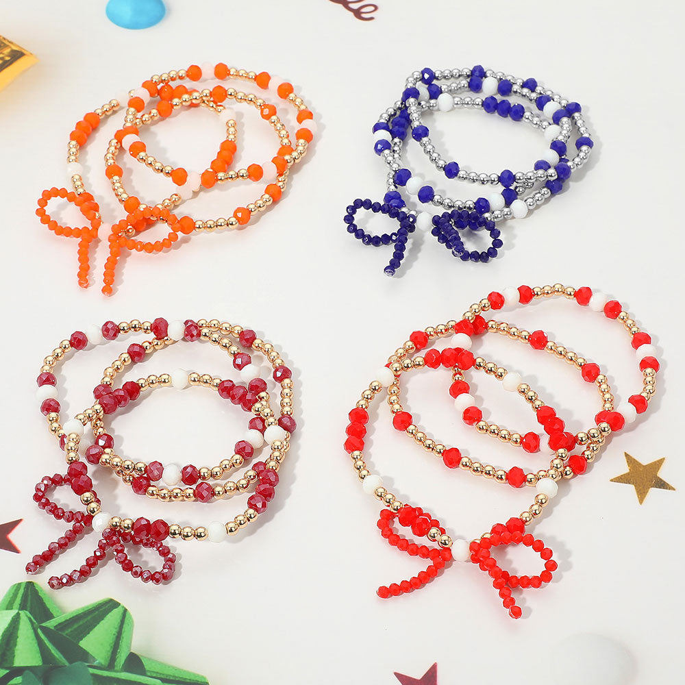 Madeline Love Blue, Rhodium, White 3PCS - Sports Team Theme Colored Bow Accent Faceted Beaded Stretch Multi Layered Bracelets - extra