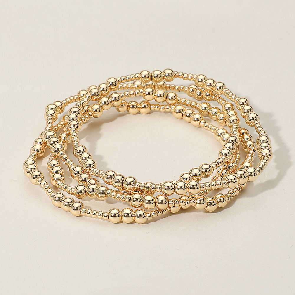 Madeline Love Gold Metal Ball Beaded Stretch Multi Layered Bracelets