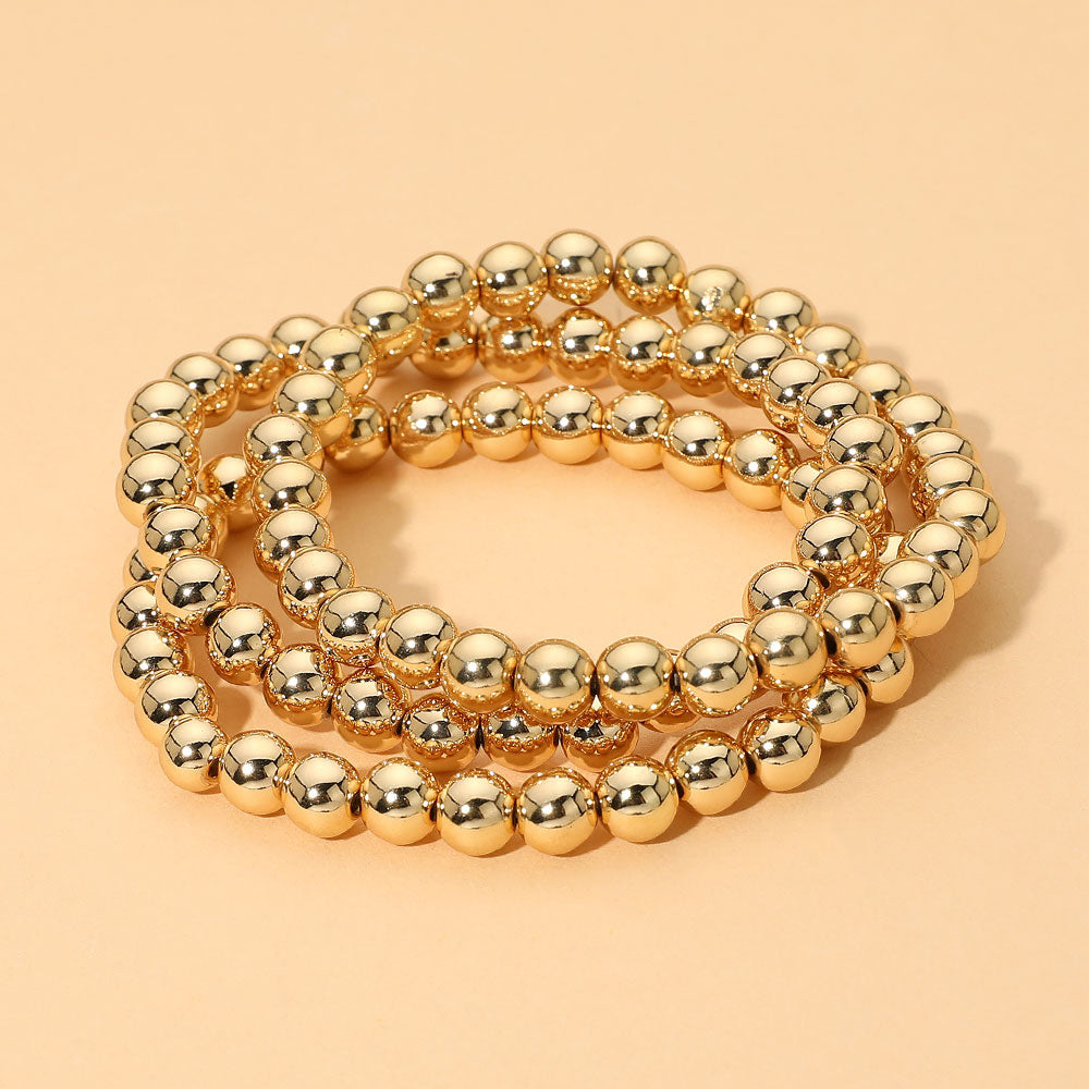 Madeline Love Gold Metal Ball Beaded Stretch Multi Layered Bracelets