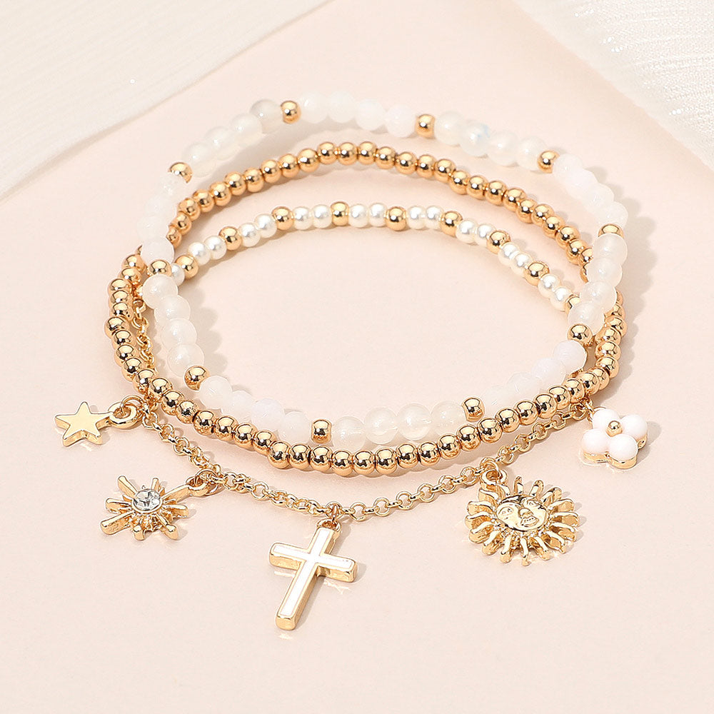 Madeline Love Gold, White 3PCS - Cross Flower Star Sunburst Charm Pearl Metal Ball Faceted Beaded Stretch Multi Layered Bracelets
