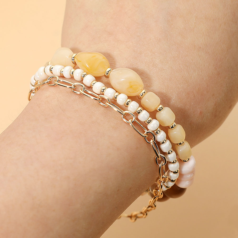 Madeline Love Gold, Ivory Pebble Beaded Stretch Metal Link Chain Multi Layered Bracelets