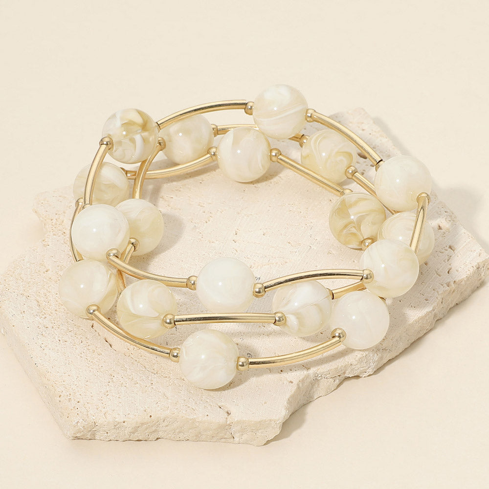 Madeline Love Ivory Round Ball Curved Bar Beaded Stretch Multi Layered Bracelets