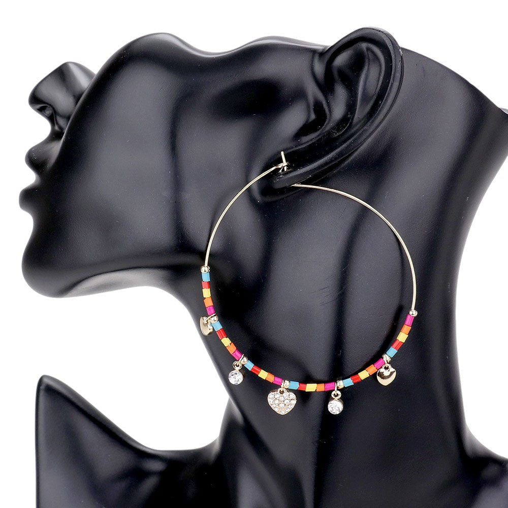 Multi Rhinestone Embellished Metal Heart Beaded Open Circle Earrings add a touch of elegance to any outfit. With intricate rhinestone details and a unique open circle design, these earrings are perfect for any occasion. Made with high-quality materials, these earrings are both stylish and durable. Upgrade your accessory game with these stunning earrings.