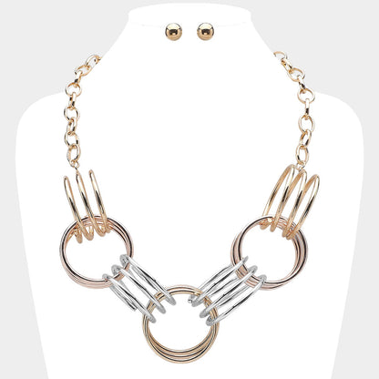Madeline Love Gold, Two Tone Abstract Triple Metal Wire Ring Link Statement Necklace - Necklaces