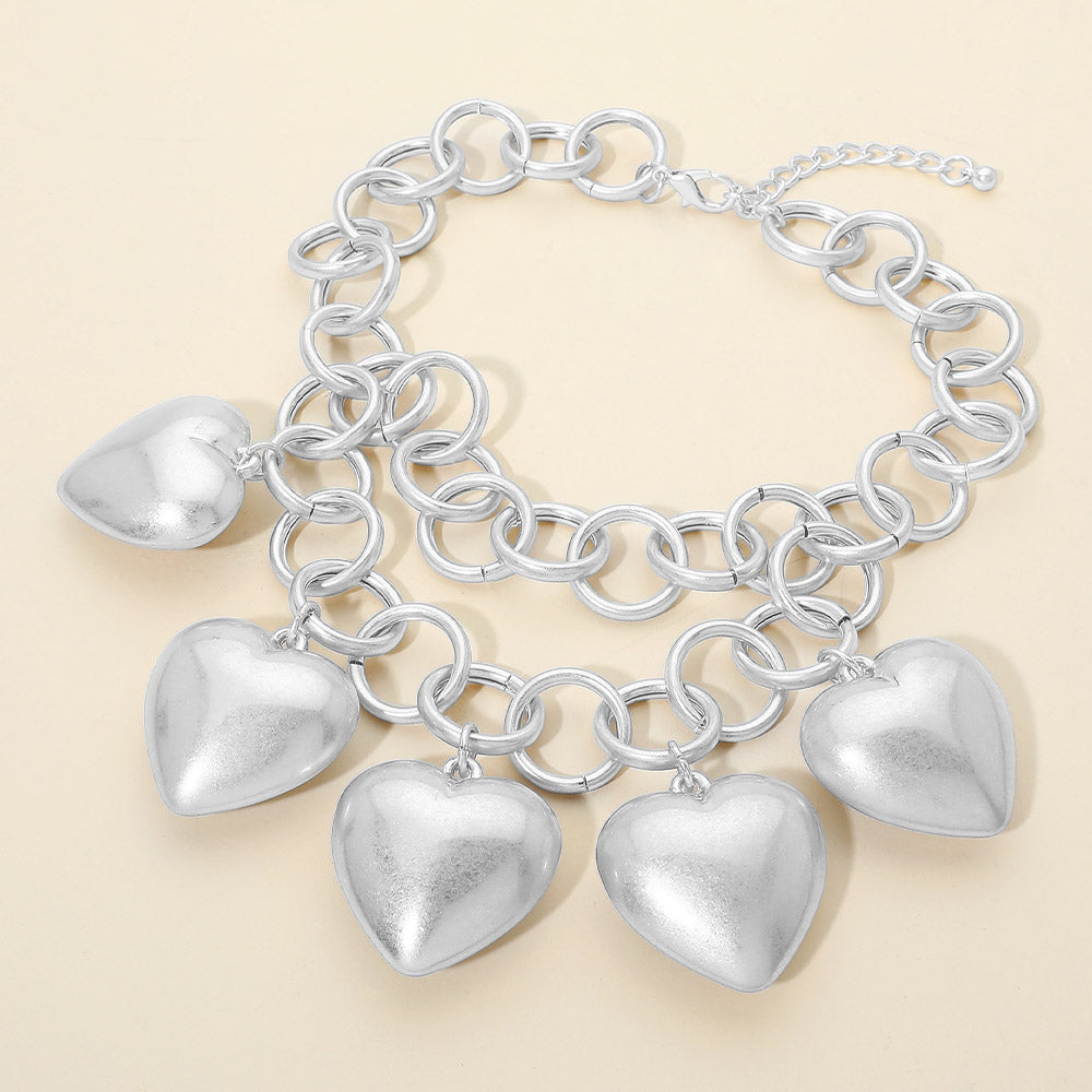 Madeline Love Matte Silver Bold Puffy Metal Heart Charm Station Linked Chain Layered Statement Necklace - Necklaces