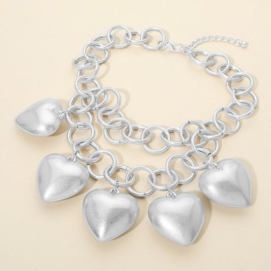 Madeline Love Matte Silver Bold Puffy Metal Heart Charm Station Linked Chain Layered Statement Necklace - Necklaces