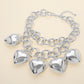 Madeline Love Rhodium Bold Puffy Metal Heart Charm Station Linked Chain Layered Statement Necklace - Necklaces