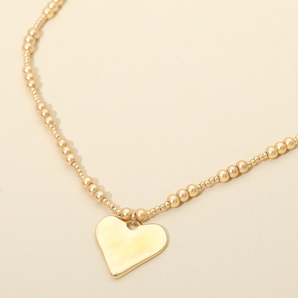 Madeline Love Gold Brushed Hammered Metal Heart Pendant Beaded Chain Necklace - Necklaces
