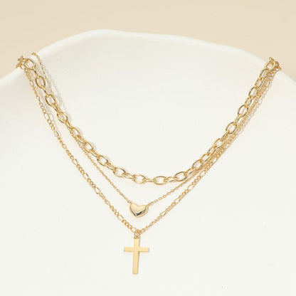 Madeline Love Gold 18K Gold Dipped Cross Pendant Heart Charm Accent Mixed Chain Layered Necklace - Necklaces