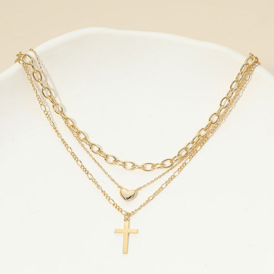 Madeline Love Gold 18K Gold Dipped Cross Pendant Heart Charm Accent Mixed Chain Layered Necklace - Necklaces